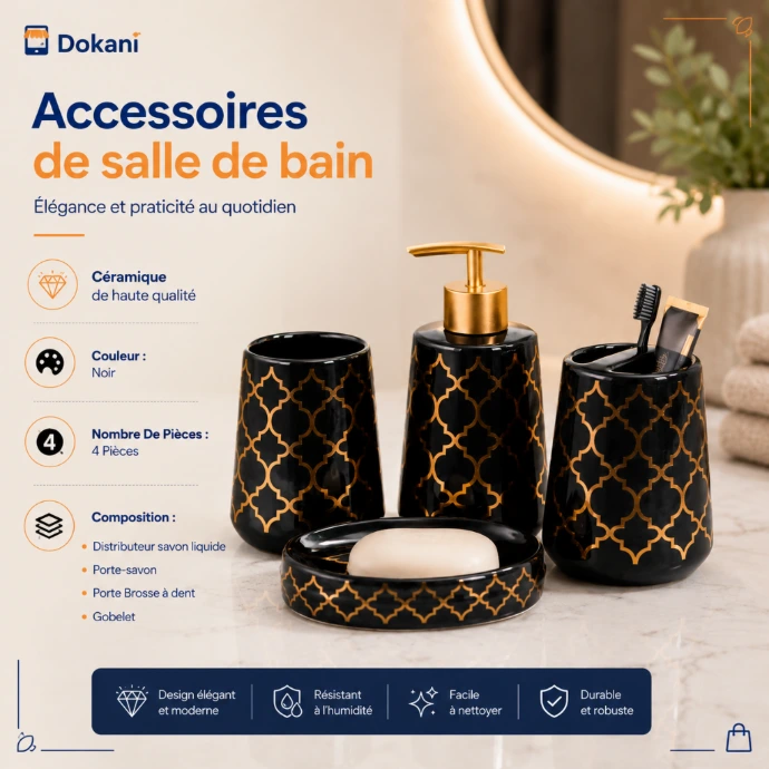 Set d'accessoires de salle de bain en ceramique noire de forme ronde avec motifs arabesques orientaux dores graves, disposes sur un meuble de vasque en marbre.